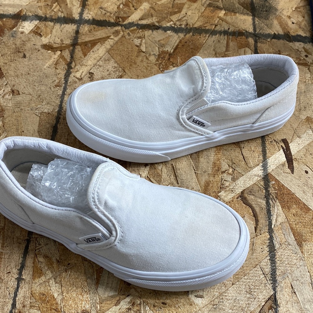 Vans kids white slip on sneakers
